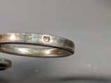two rings that are sitting on top of each other