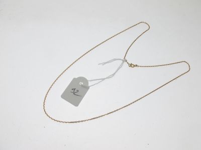 gros plan d'un collier auquel est attachée une étiquette