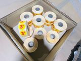 many rolls of toilet paper in a box on the floor