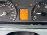 a close up of a car dashboard with a speedometer