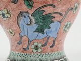 an image of a vase with a blue horse on it