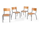 four chairs sitting next to each other on a white surface