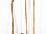 three different types of hammers and a hammer on a white surface