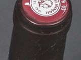 a close up of a bottle of wine on a table