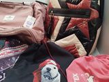 a lot of bags that are sitting on the floor