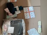 a cardboard box with a bunch of items inside of it