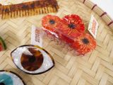a tray with various types of sushi on it