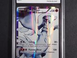 a close up of a card in a plastic case on a table