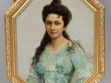 portrait of a woman in a blue dress in a gold frame