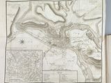 an old map of the city of boston with a map of the area