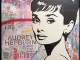 une photo d'un tableau représentant une femme accroché au mur