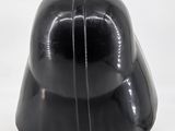 a black helmet that is shaped like a darth vader ' s helmet