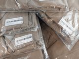 a pile of packages sitting on top of a table