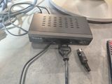 an image of a remote control sitting on top of a table