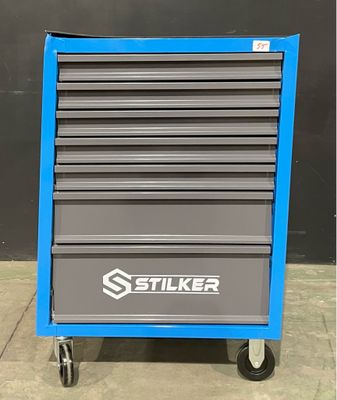 un gros plan d'une armoire à outils bleue et grise montée sur roulettes