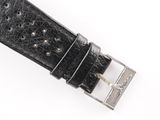 black leather watch strap with silver buckle on a white background