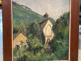 an oil painting of a church on a hill in a wooden frame