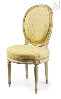 the chair is made of wood and has a yellow upholstered seat