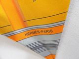 yellow tie with orange and blue stripes and a logo on it