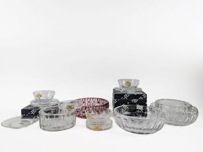 a lot of glass items that are sitting on a table