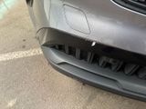 a close up of the front bumper of a car