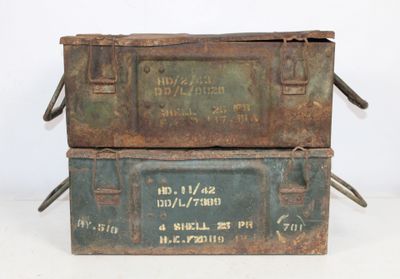 two old metal boxes stacked on top of each other