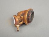 a rusted pipe that has been placed on the ground