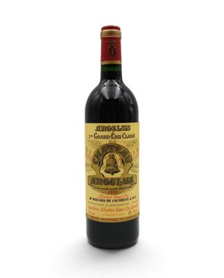 a bottle of wine that is sitting on a table
