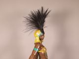 a figurine of a woman with a mohawk on her head