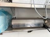 une image représentant une machine posée sur une étagère