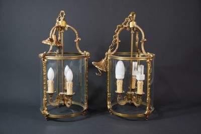 pair of antique brass and glass wall sconces