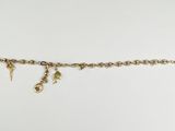 a gold chain with a bunch of charms hanging from it