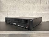 an image of a black amplifier sitting on top of a table