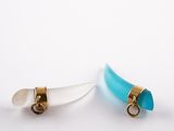 pair of blue and white glass earrings with a gold clasp