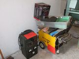a pile of assorted items sitting on the floor