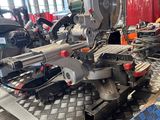 a picture of a machine in a workshop with tools