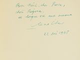 an old book with a handwritten poem on the cover