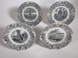 four black and white plates with different designs on them