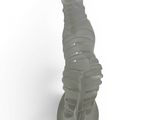 a glass sculpture of a man on a white surface