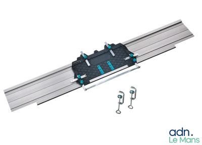 a close up of a metal rail with screws on it