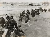 a lot of soldiers that are walking in the water