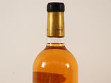 a bottle of alcohol that is sitting on a table