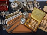 a table with silverware and silverware on it