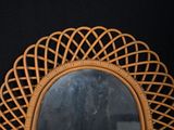 a mirror that is sitting on top of a table