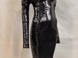 a black sequinized dress on a mannequin mannequin mannequin mannequin mannequin mannequin mannequin mannequin
