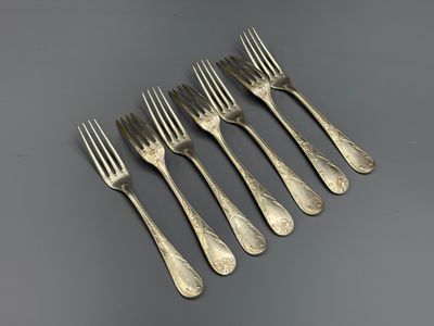 un service de six fourchettes et cuillères en métal argenté