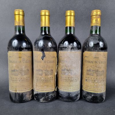 three bottles of wine sitting next to each other on top of a table