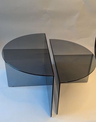 two tables that are sitting side by side on a white background