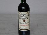 a bottle of wine that is sitting on a table