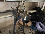 a machine that is sitting in a room with a lot of wires